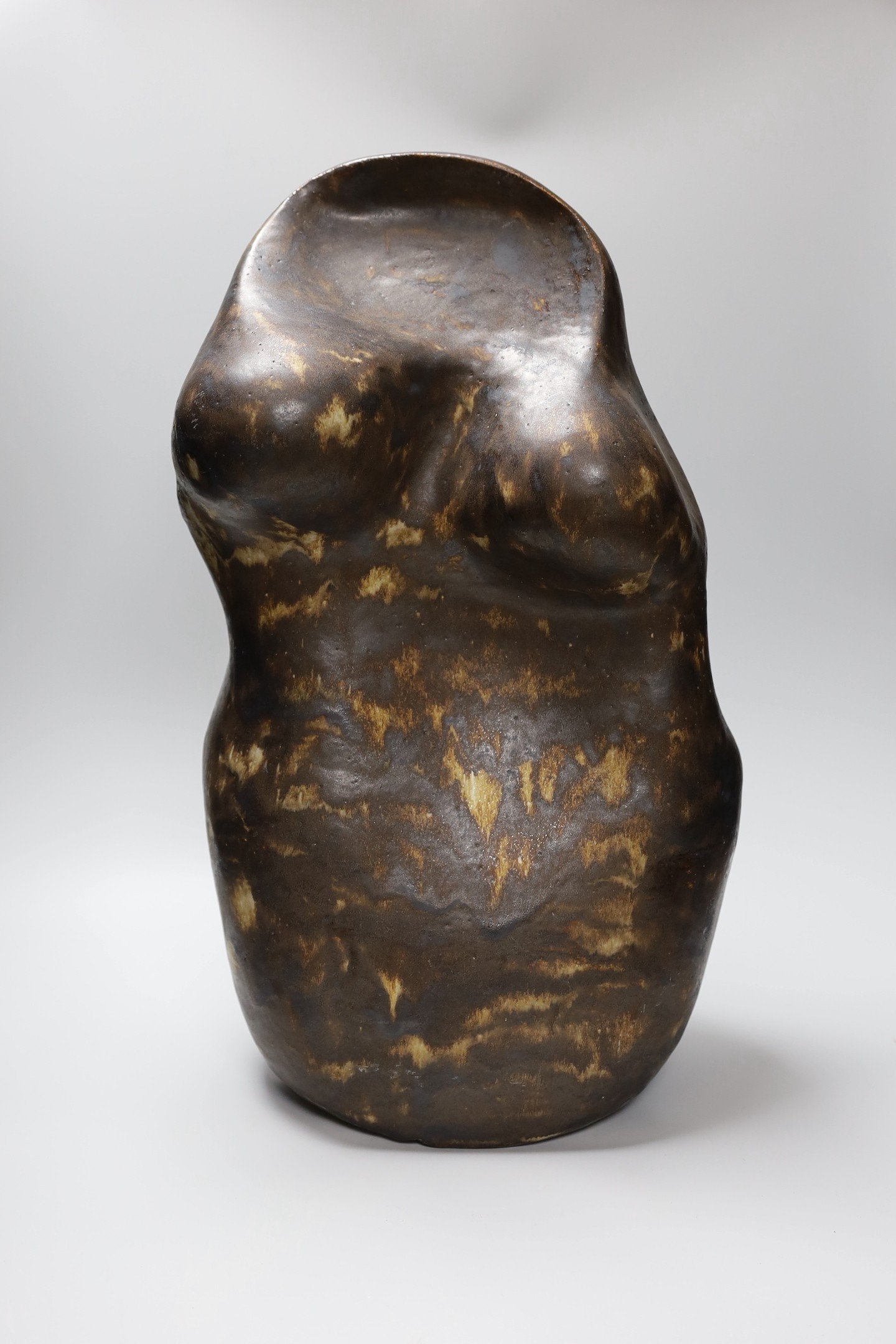 Ruth Sulke - a large studio brown glazed stoneware ’torso’ sculpture, 1986, 54cm, See Sulke, Ruth - Ceramic Sculpture by Ruth Sulke, Hanart 2 Gallery, 1987, page 44.